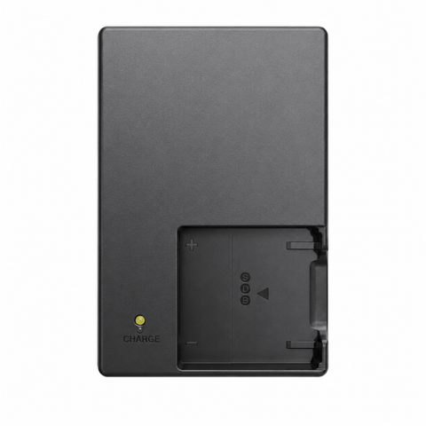 Ricoh BJ-10 acculader voor DB-100, zwart met accuvak en oplaadlampje Charge, bovenkant