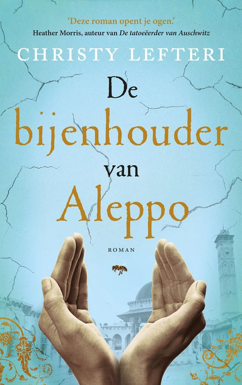De bijenhouder van Aleppo, Christy Lefteri, roman, lichtblauwe omslag met twee handen en een bij, tweedehands