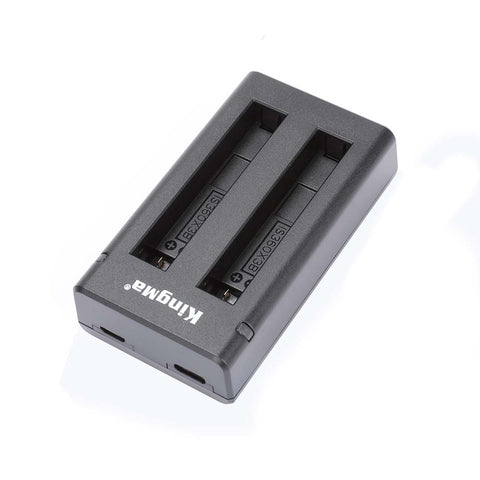 KingMa dubbele USB-lader voor Insta360 One X3, zwart, bovenkant met twee laadvakken gemarkeerd IS360X3B