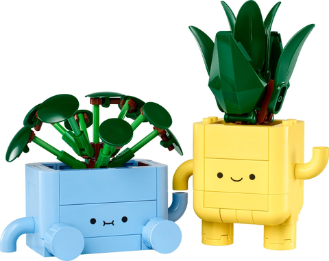 LEGO Botanicals 10349 Vrolijke Plantjes, gebouwd model: pannenkoekplant in blauwe pot en drakenbloedboom in gele pot