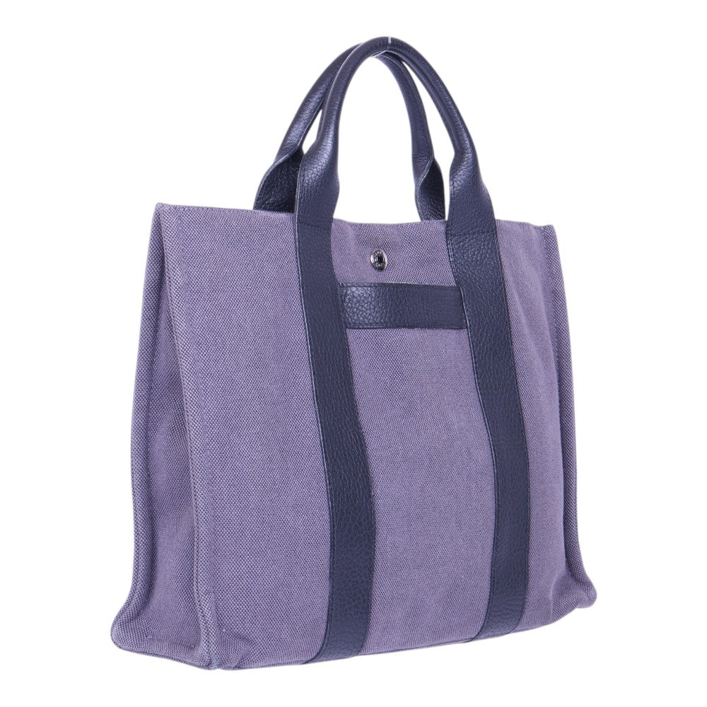 Hermès Fourre Tout MM canvas paars, schuin van rechts met hengsels
