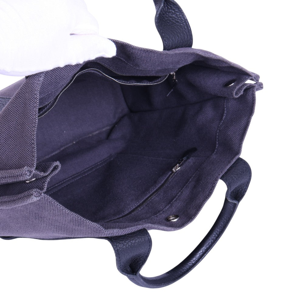Hermès Fourre Tout MM canvas paars, binnenkant met twee vakken met rits