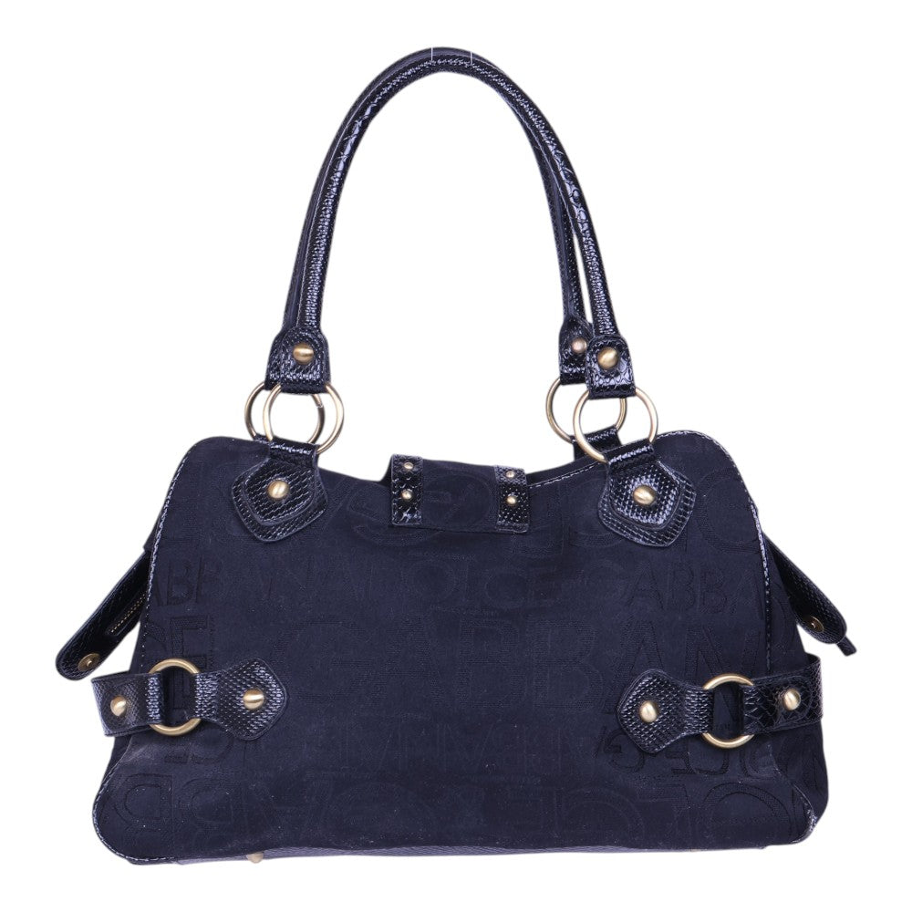 Dolce & Gabbana schoudertas monogram canvas zwart, achterkant rechtopstaand met twee riempjes met ringen