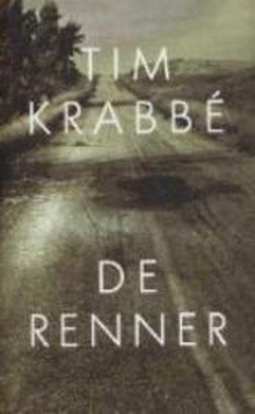 De renner, Tim Krabbé, boekomslag voorkant met een mistige weg, tweedehands