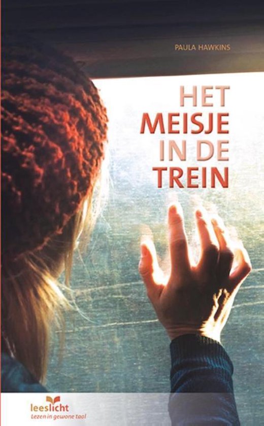 Het meisje in de trein, Paula Hawkins, boekomslag voorkant met een vrouw die uit een treinraam kijkt, tweedehands