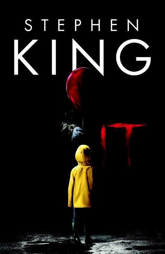 It, Stephen King, filmeditie, zwarte boekomslag voorkant met kind in gele regenjas en rode ballon, tweedehands