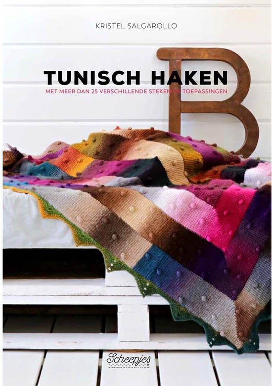Tunisch Haakboek, Kristel Salgarollo, boekomslag voorkant met een kleurrijke gehaakte deken, tweedehands