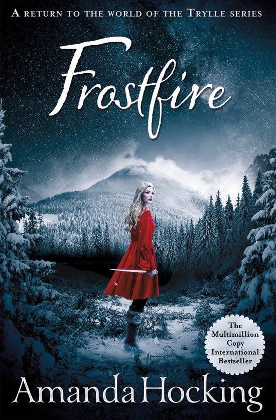 Frostfire, Amanda Hocking, blauwe omslag met een vrouw in een rode jas in een besneeuwd bos, tweedehands