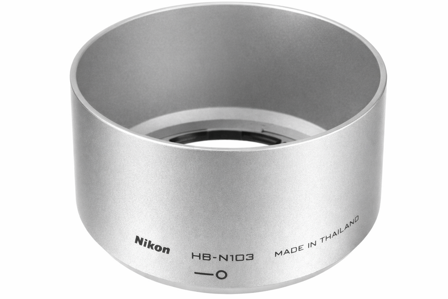 Nikon HB-N103 zonnekap, zilver, met opschrift Nikon HB-N103, tweedehands