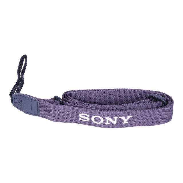 Sony vintage camerariem, grijs, opgevouwen riem met wit Sony-opschrift en bevestigingslus, tweedehands