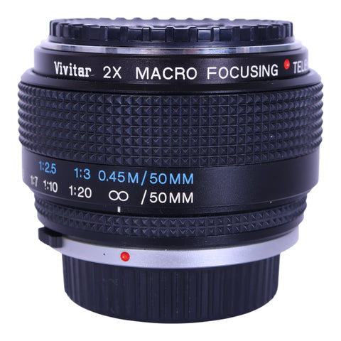 Vivitar 2x Macro Focusing Teleconverter MC voor Olympus OM, zijkant met opschrift en afstandsschaal, tweedehands