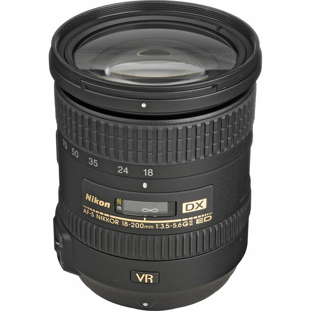 Nikon AF-S DX Nikkor 18-200mm f/3.5-5.6G II ED VR zoomlens, zijkant met zoomschaal en VR-opschrift, tweedehands