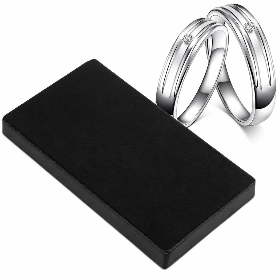 Toetssteen voor goud, zilver en platina testen, 7 x 4 cm x 6 mm, zwarte steen naast twee zilveren ringen, tweedehands