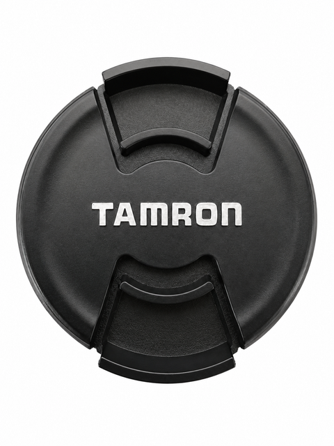 Tamron lensdop 52mm, zwart met wit Tamron-logo en knijpgrepen in het midden, voorkant