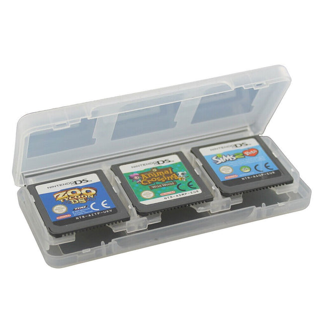 Case voor 6 DS game cartridges, doorzichtig, geopend met drie DS-spellen erin, tweedehands