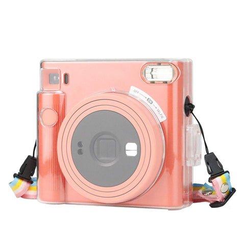 Case voor Instax SQUARE SQ1 transparant, met regenboogriempje en een oranje Instax SQ1-camera erin, tweedehands