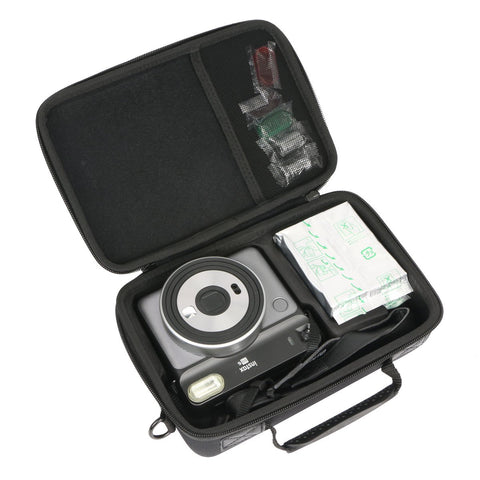 Harde draagtas voor Instax SQUARE SQ1 met filmhouder en schouderriem, zwart, geopend met een Instax-camera erin, tweedehands