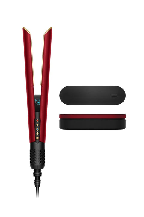 Dyson Airstrait stijltang, Red Velvet en goud, met zwart-rood etui ernaast, tweedehands