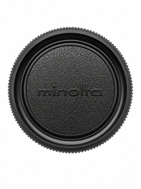 Minolta MC/MD-mount body cap lederlook, zwart met minolta-logo en geribbelde rand, voorkant