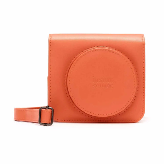 Fujifilm Instax Square SQ1 case, oranje, gesloten hoes van voren met instax-opdruk en riem, tweedehands