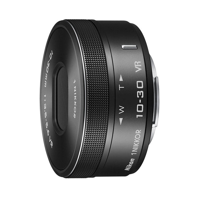 Nikon 1 Nikkor 10-30 mm f/3.5-5.6 VR lens, zwart, zijkant met zoomring en opschrift 10-30, tweedehands