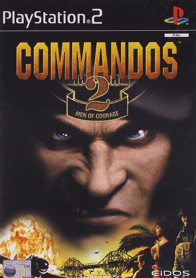 PlayStation 2 Commandos 2 Men of Courage van Eidos, doos voorkant met een grimmig gezicht en een explosie, tweedehands