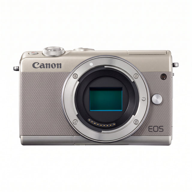 Canon EOS M100 systeemcamera body, grijs, voorkant zonder lens met open EF-M-vatting