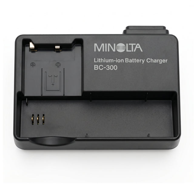 Minolta BC-300 acculader voor NP-200, zwarte lithium-ion battery charger met laadvak, tweedehands