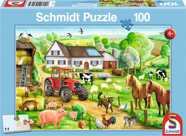 Schmidt Op de Boerderij puzzel 100 stukjes, doos voorkant met tractor en boerderijdieren