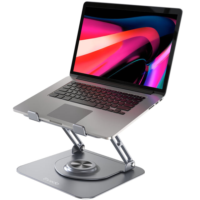 Thredo aluminium laptopstandaard verstelbaar en 360 graden draaibaar, grijs, met een MacBook erop, schuin van voren