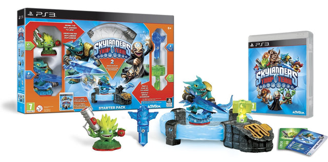PlayStation 3 Skylanders Trap Team Starter Pack in doos, met portaal, spel en figuren ernaast, tweedehands